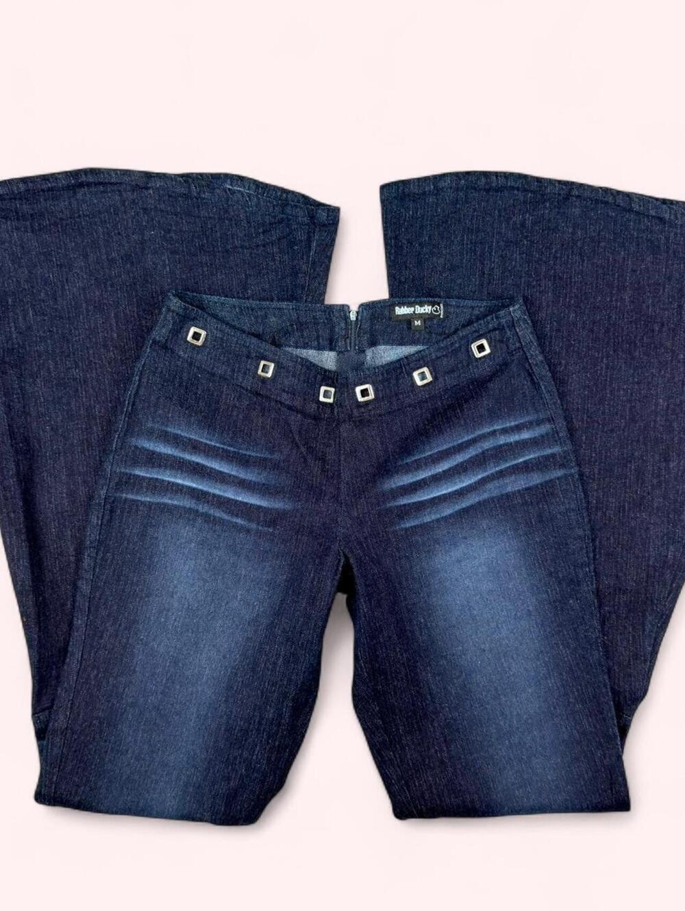 Vintage low rise flare jeans with silver accents